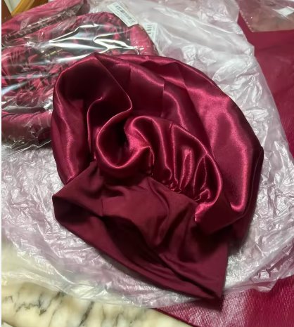 Customer photo: the satin sleep bonnet as it arrives in its packaging